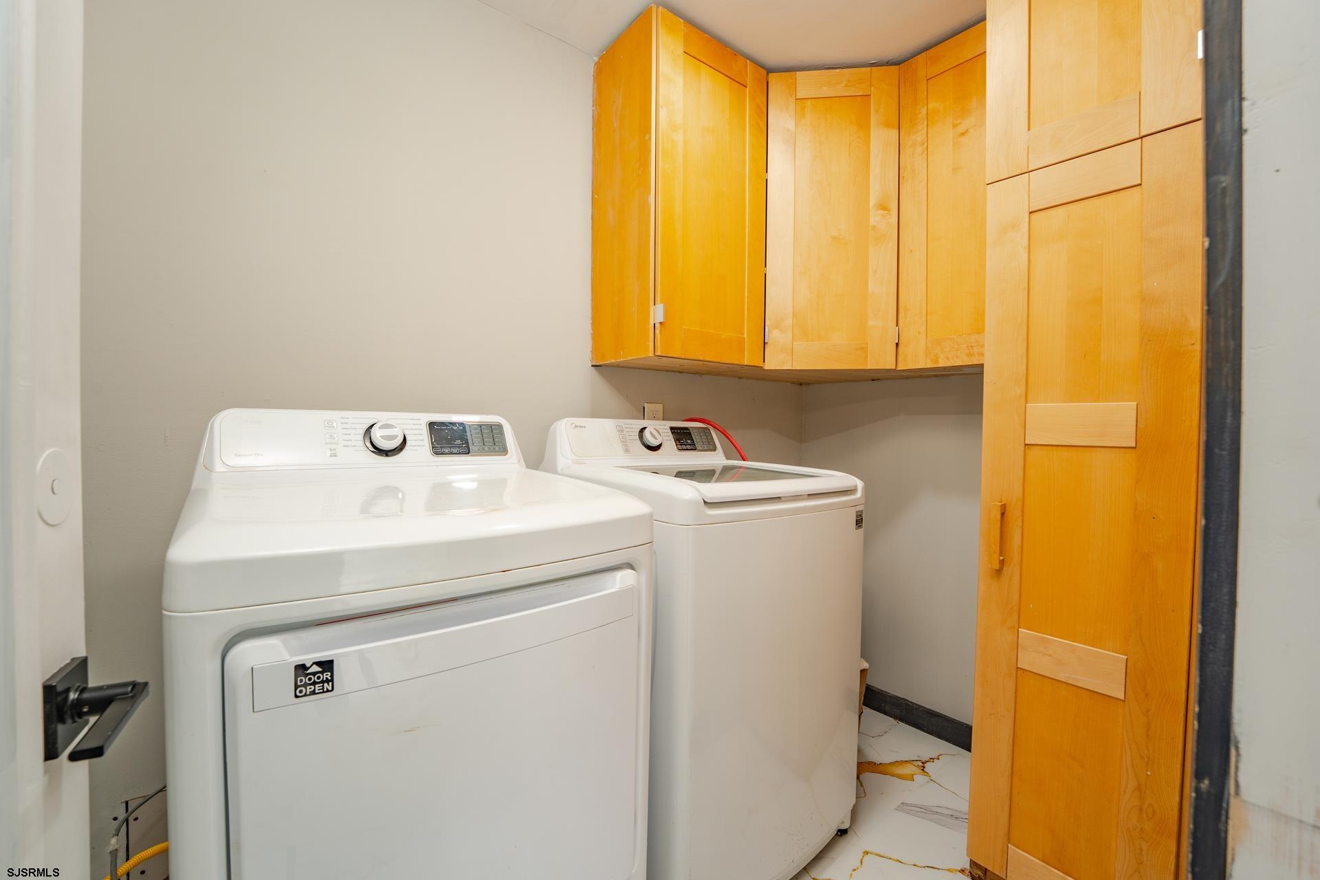 1203 West Mill Road Northfield, NJ 08225 - Photo 17 of 90 a utility room with a window washer and dryer