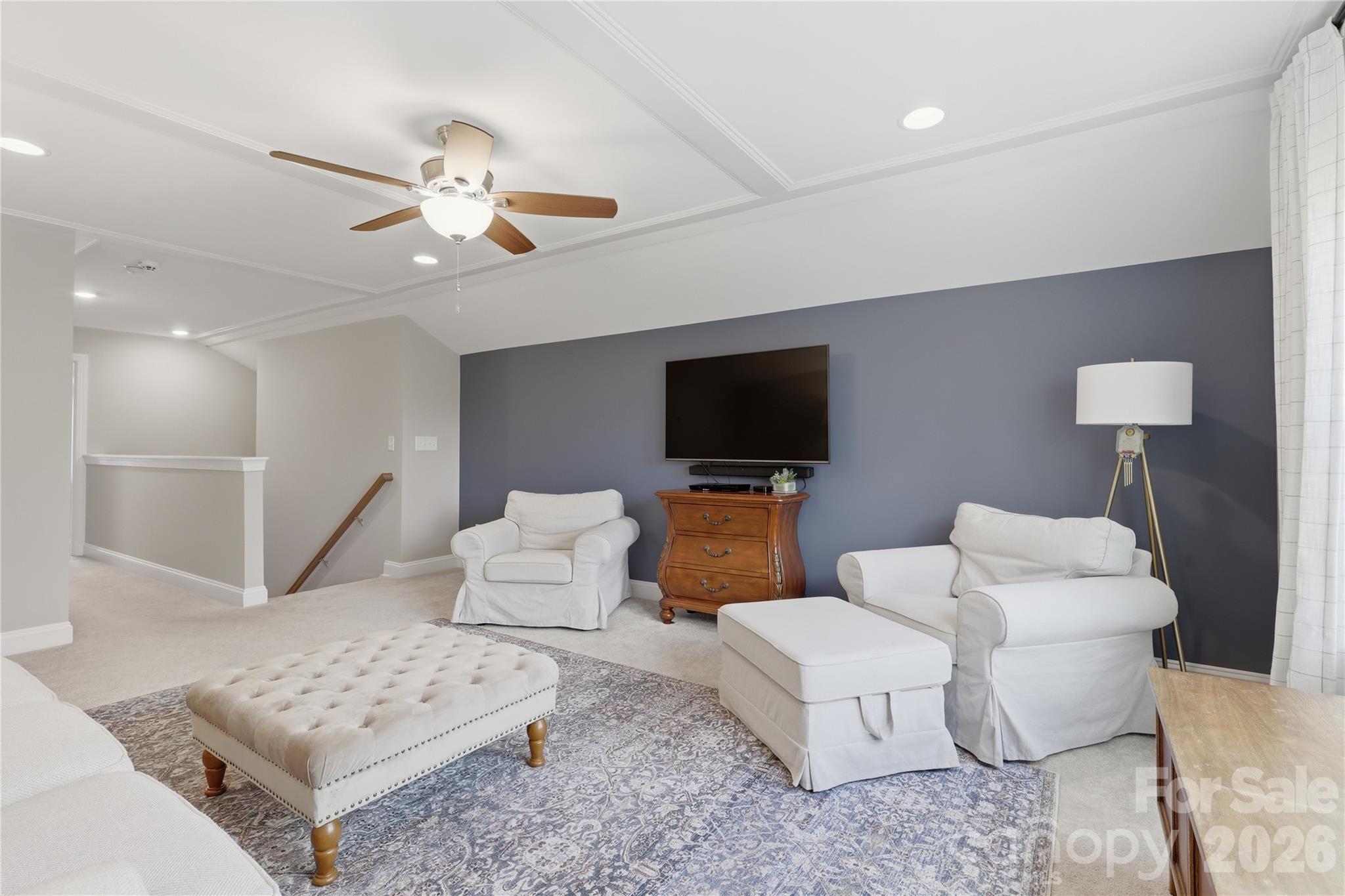 3023 Eagle Ridge Lane Indian Trail, NC 28079 - Photo 35 of 47 a living room with furniture and a flat screen tv