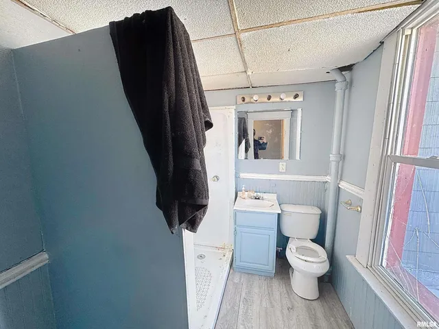 a kitchen with a stove a sink and a refrigerator