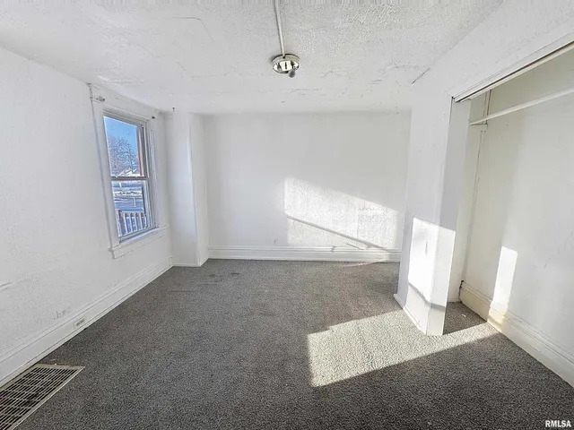 a view of entryway with white walls