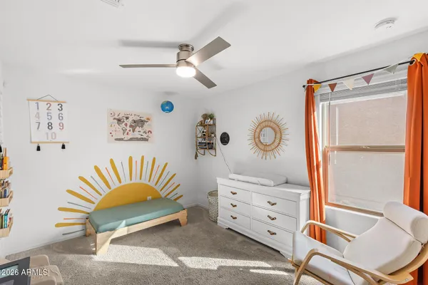 a room with furniture and a window