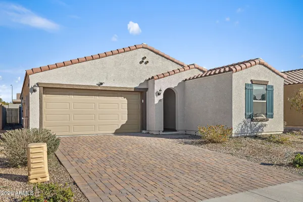 a front view of a house with a garage