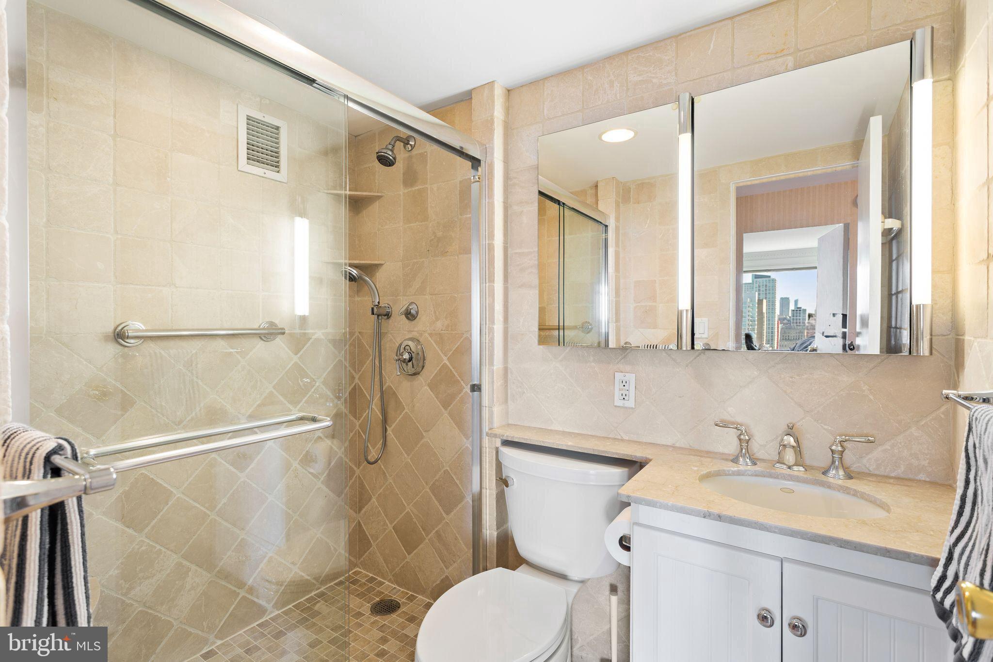 200 Locust Street, Unit 29AN Philadelphia, PA 19106 - Photo 21 of 58 a bathroom with a sink toilet and shower