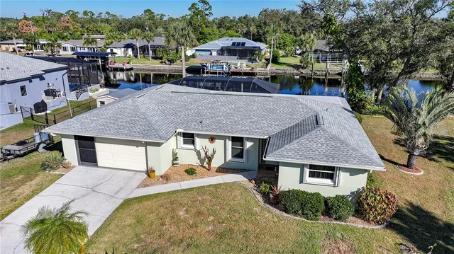 a aerial view of a house with a patio