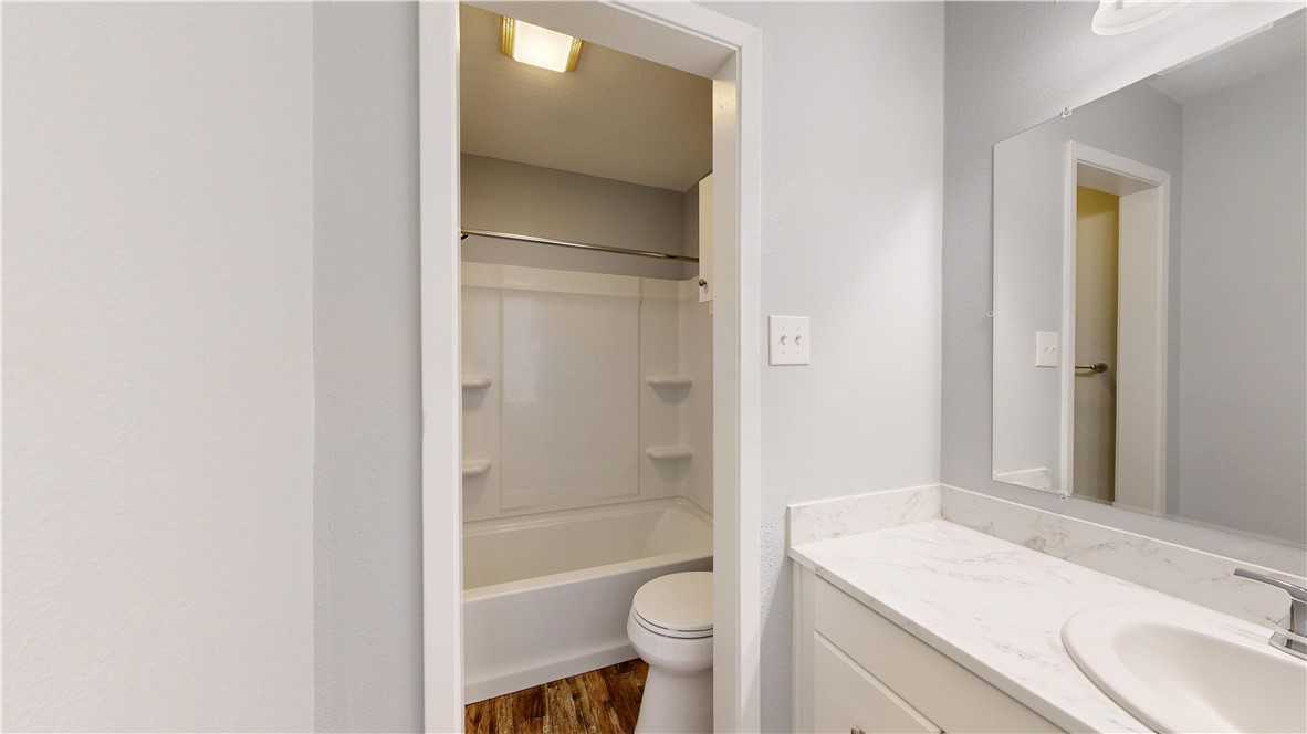 1325 Airline Drive College Station, TX 77845 - Photo 20 of 26 a bathroom with a sink toilet and shower