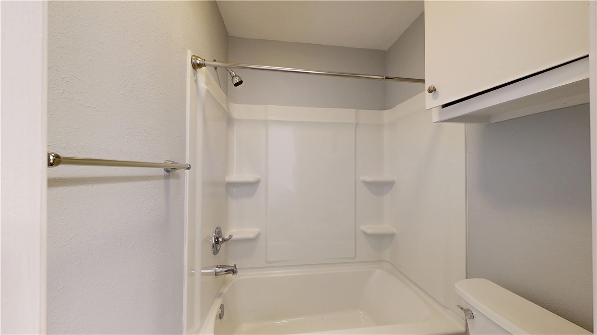 1325 Airline Drive College Station, TX 77845 - Photo 21 of 26 a bathroom with a shower