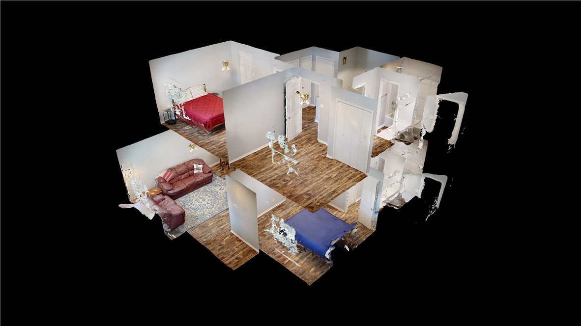 1325 Airline Drive College Station, TX 77845 - Photo 25 of 26 a living room with furniture and a wooden floor