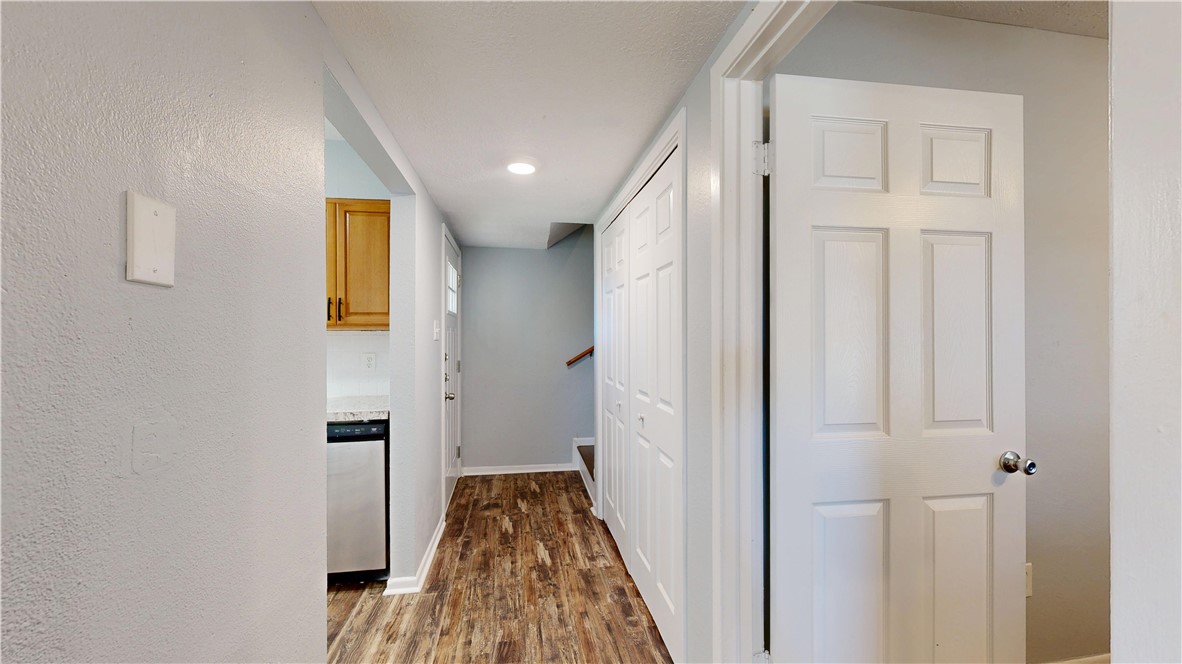 1325 Airline Drive College Station, TX 77845 - Photo 4 of 26 a view of a hallway with wooden floor and closet