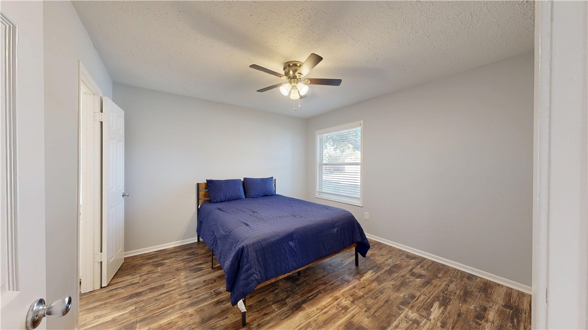1325 Airline Drive College Station, TX 77845 - Photo 8 of 26 a bedroom with a bed and a window