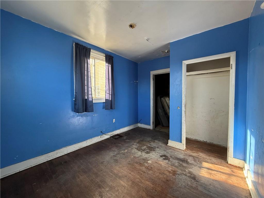 114 Thompson Avenue Donora, PA 15033 - Photo 15 of 32 a view of an empty room with closet and a window