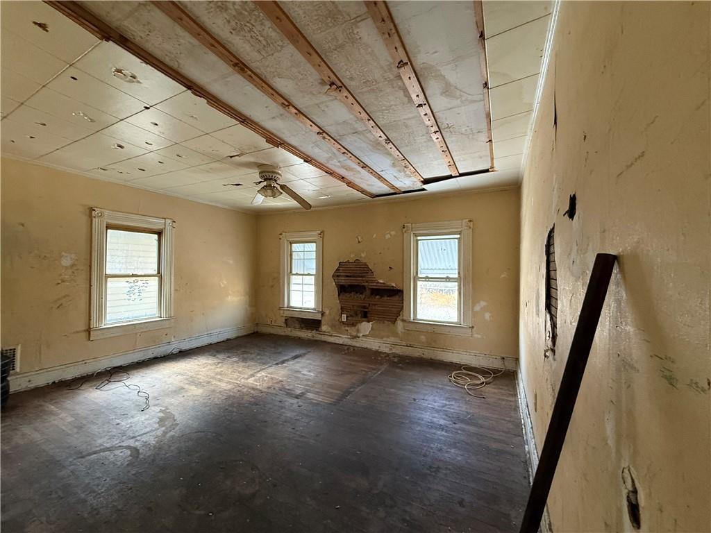 114 Thompson Avenue Donora, PA 15033 - Photo 16 of 32 a view of empty room with wooden floor and fan
