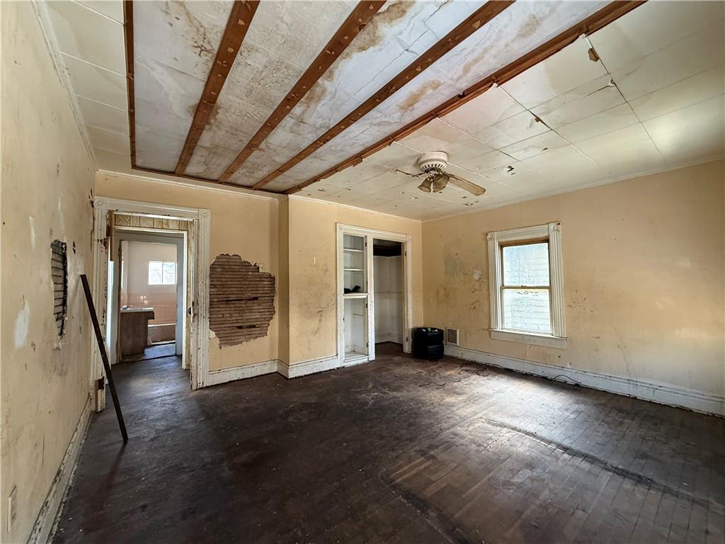 114 Thompson Avenue Donora, PA 15033 - Photo 17 of 32 a view of empty room with wooden floor and fan