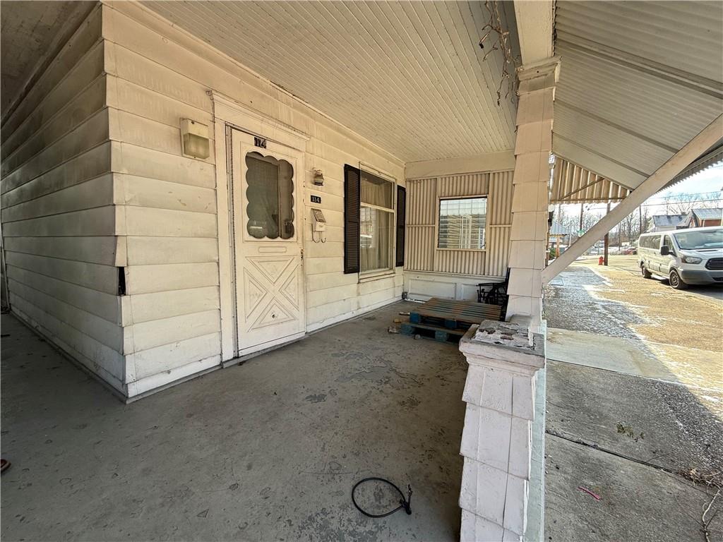 114 Thompson Avenue Donora, PA 15033 - Photo 2 of 32 a view of a porch with seating space