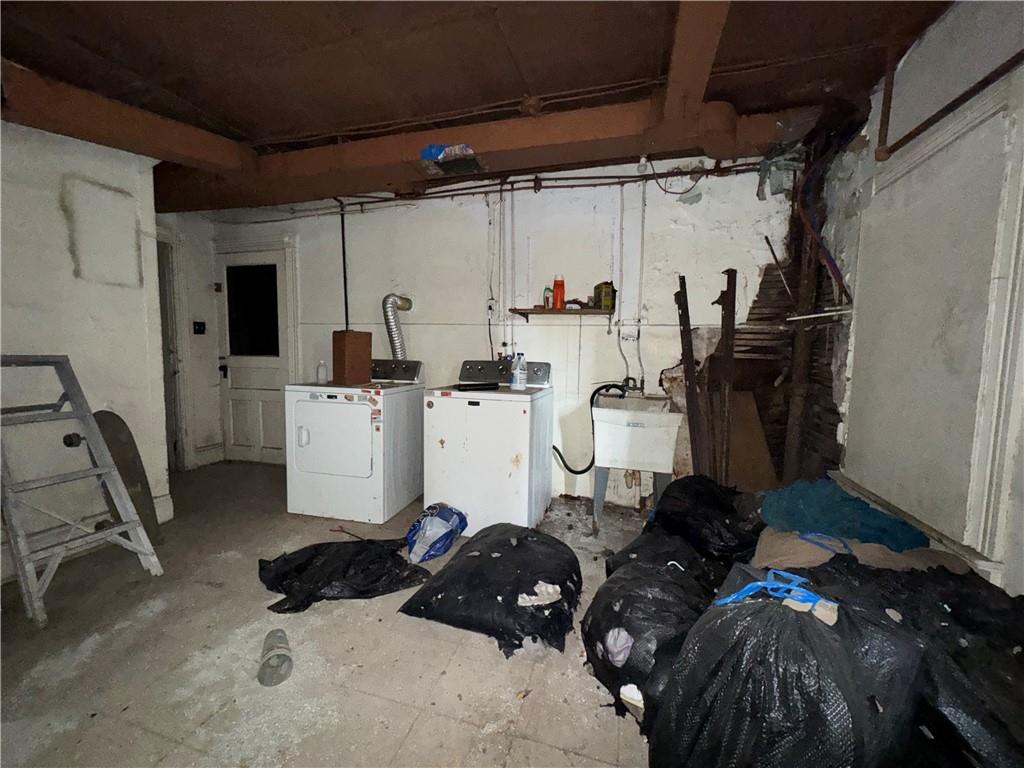 114 Thompson Avenue Donora, PA 15033 - Photo 25 of 32 a storage room with lots of appliances and cabinets