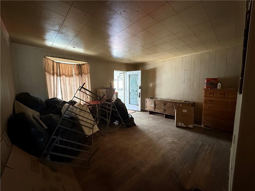 114 Thompson Avenue Donora, PA 15033 - Photo 8 of 32 a bed room with furniture and a window