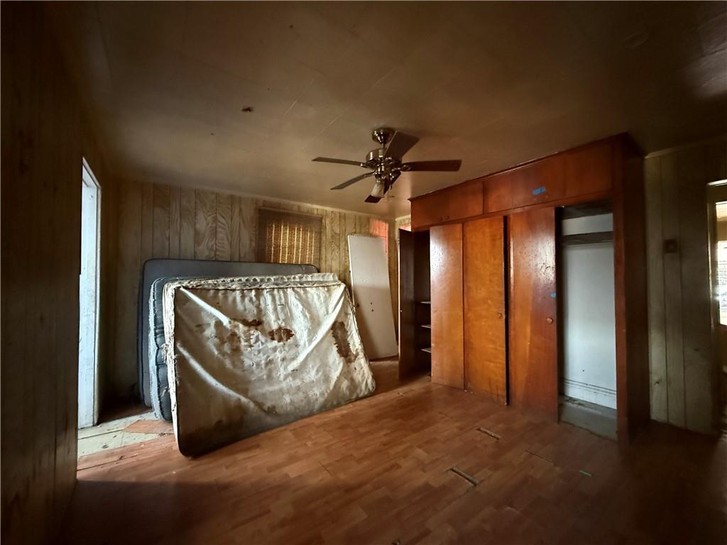 114 Thompson Avenue Donora, PA 15033 - Photo 10 of 32 a view of a livingroom with furniture and a ceiling fan