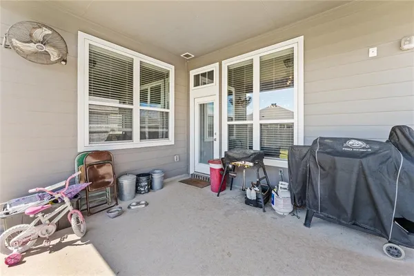 a bedroom with furniture and a window