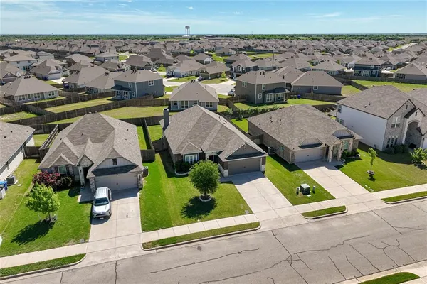an aerial view of a house with a garden