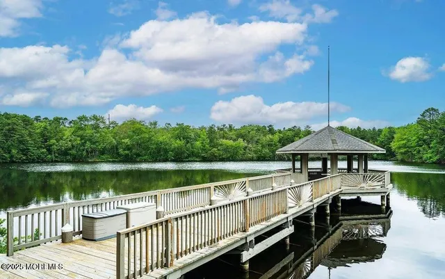 a view of a lake with a deck