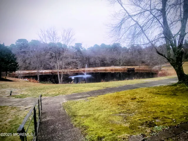 a view of a swimming pool and an outdoor space