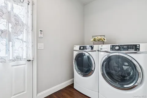 a utility room with dryer and washer