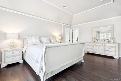 a bed room with double bed and a night stand