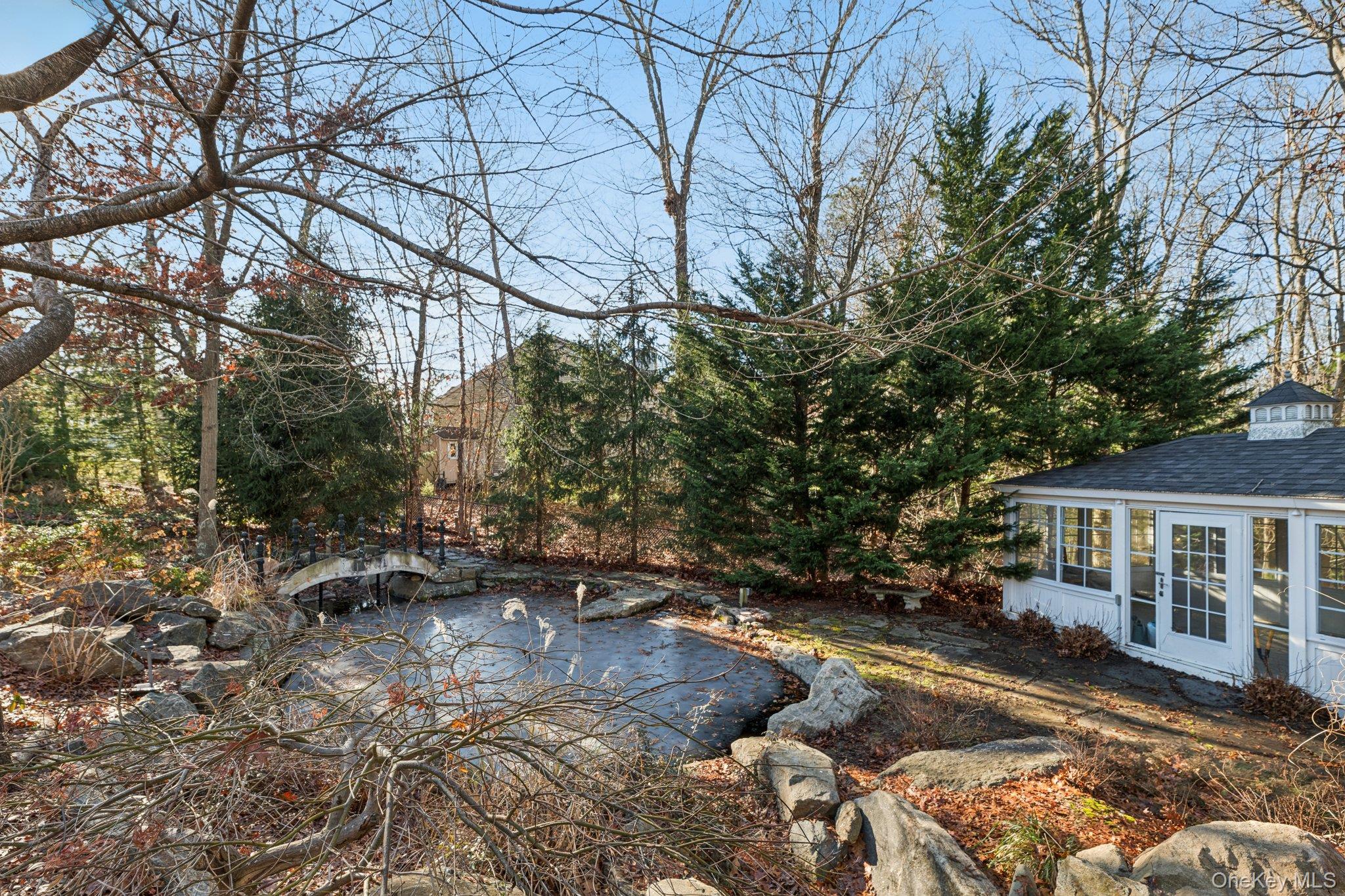7 Brittany Court Ridge, NY 11961 - Photo 40 of 45 pond and greenhouse