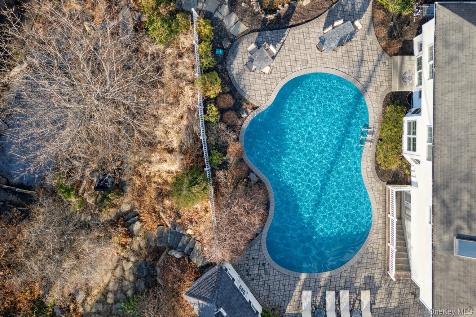 7 Brittany Court Ridge, NY 11961 - Photo 41 of 45 Aerial view of a pool