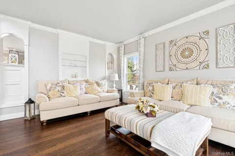 a spacious bedroom with a bed and a couch