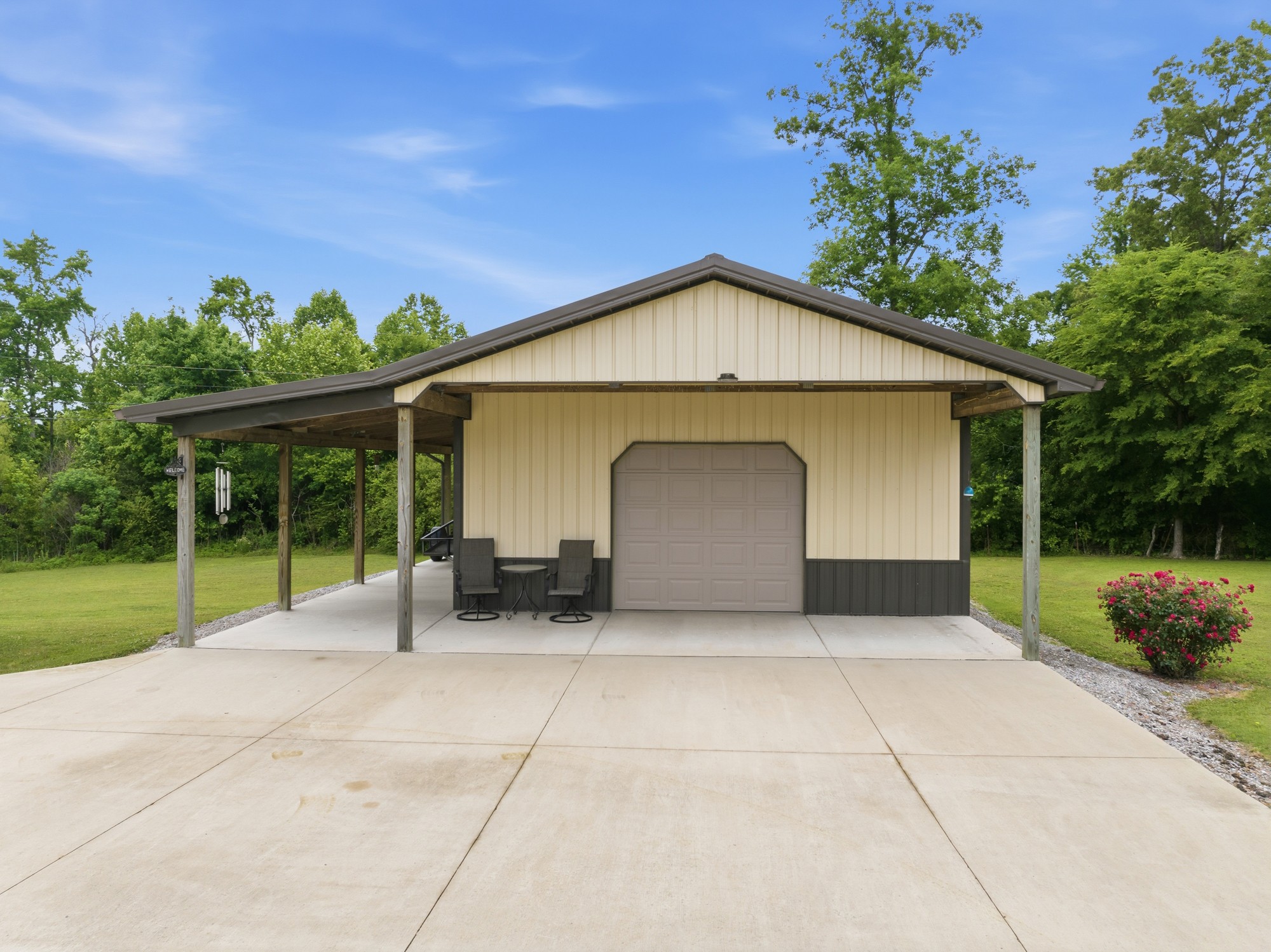 944 Brooksie Thompson Road Decaturville, TN 38329 - Photo 33 of 47 a front view of a house with garden