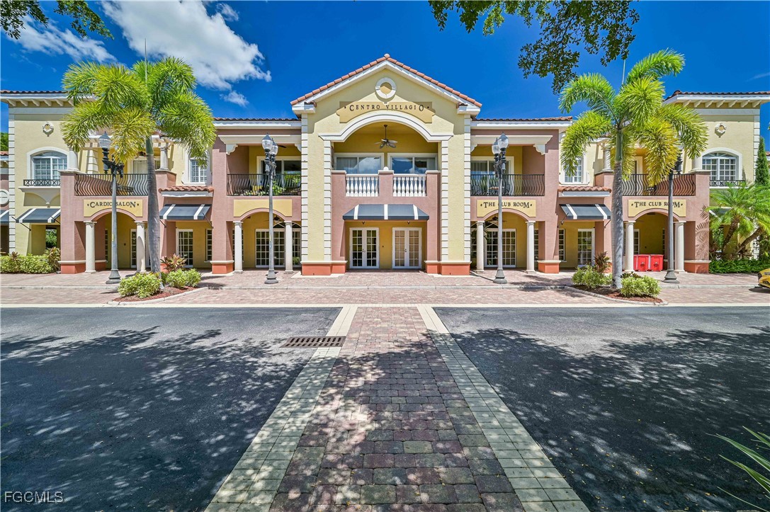 20201 Estero Gardens Circle, Unit 103 Estero, FL 33928 - Photo 3 of 33 a view of a building with a street