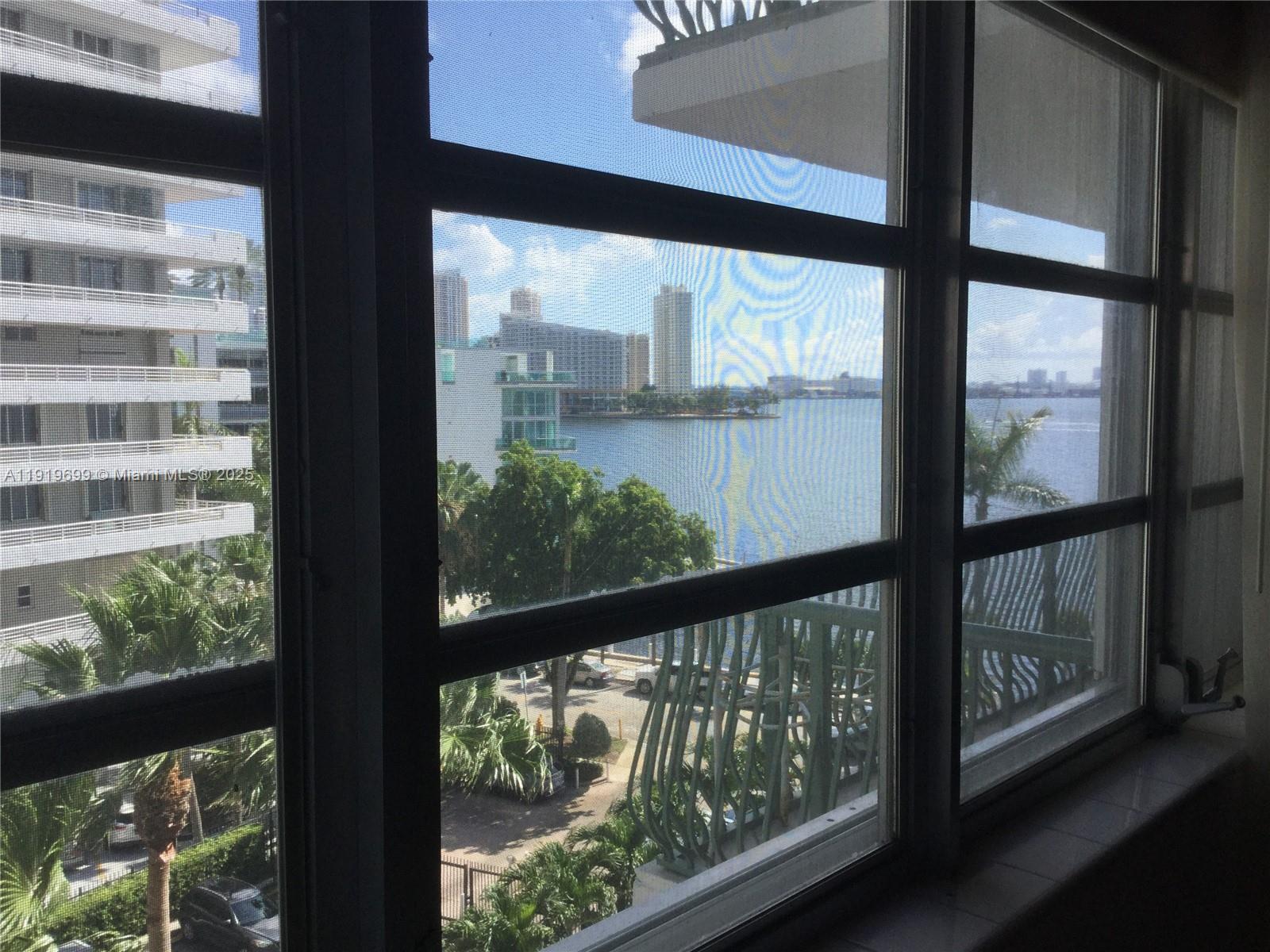 1408 Brickell Bay Drive, Unit 612 Miami, FL 33131 - Photo 14 of 27 a view of a city from a window