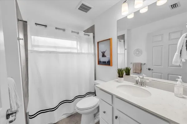 a living room with furniture and window