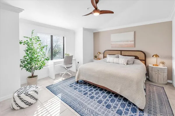 a view of a dining room with furniture wooden floor and a chandelier