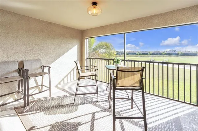 an aerial view of a house with a ocean view