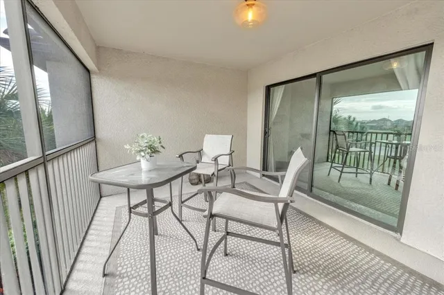 an aerial view of a house with outdoor space