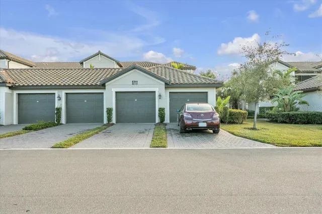 a view of a swimming pool with a lake view
