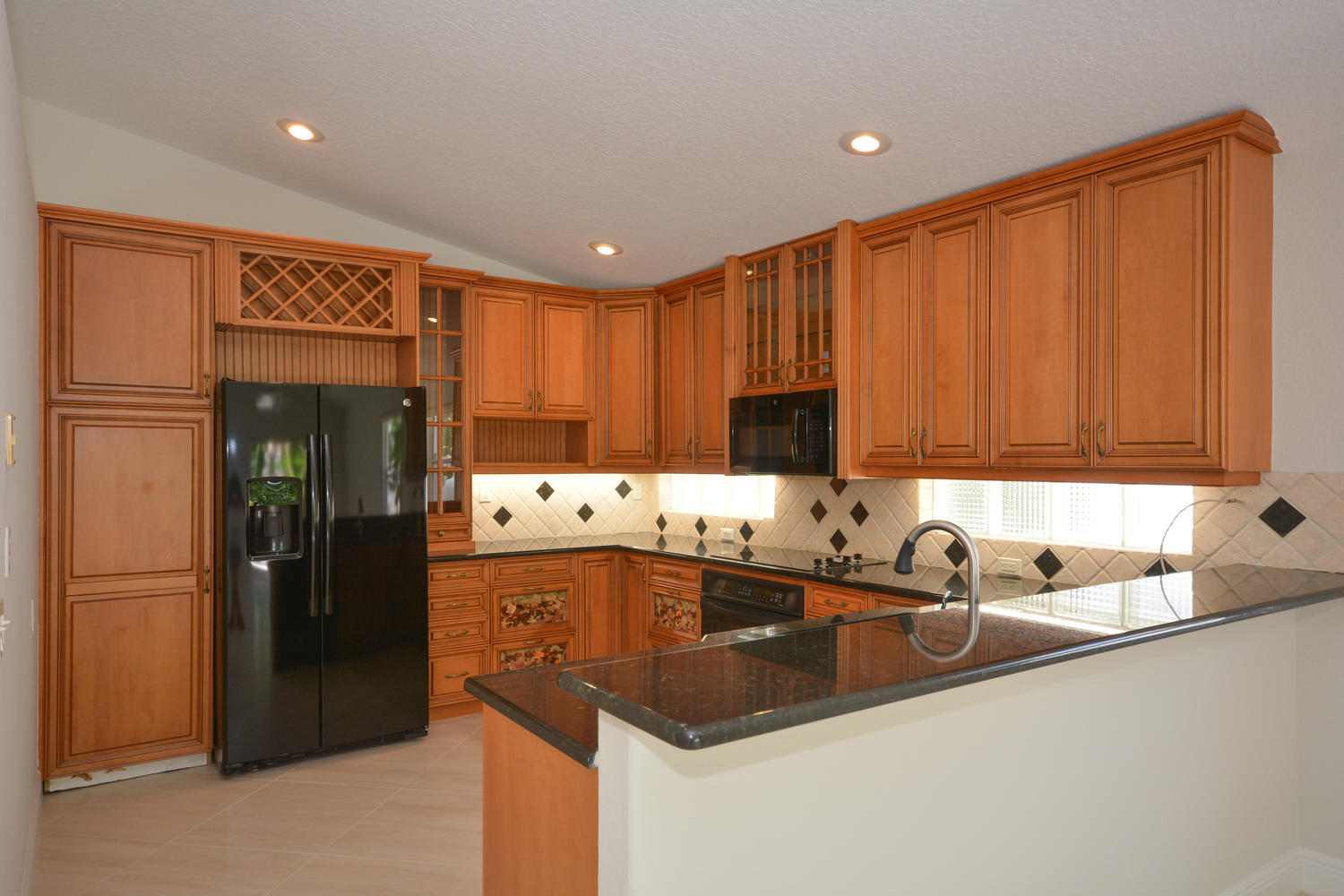 10784 Crescendo Circle Boca Raton, FL 33498 - Photo 10 of 41 kitchen fridge