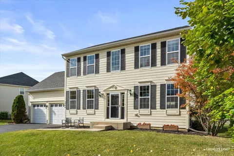 front view of house with a yard