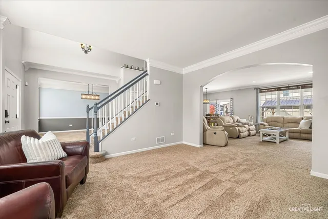 a view of livingroom with furniture and white walls