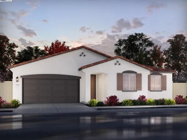 a front view of a house with garage