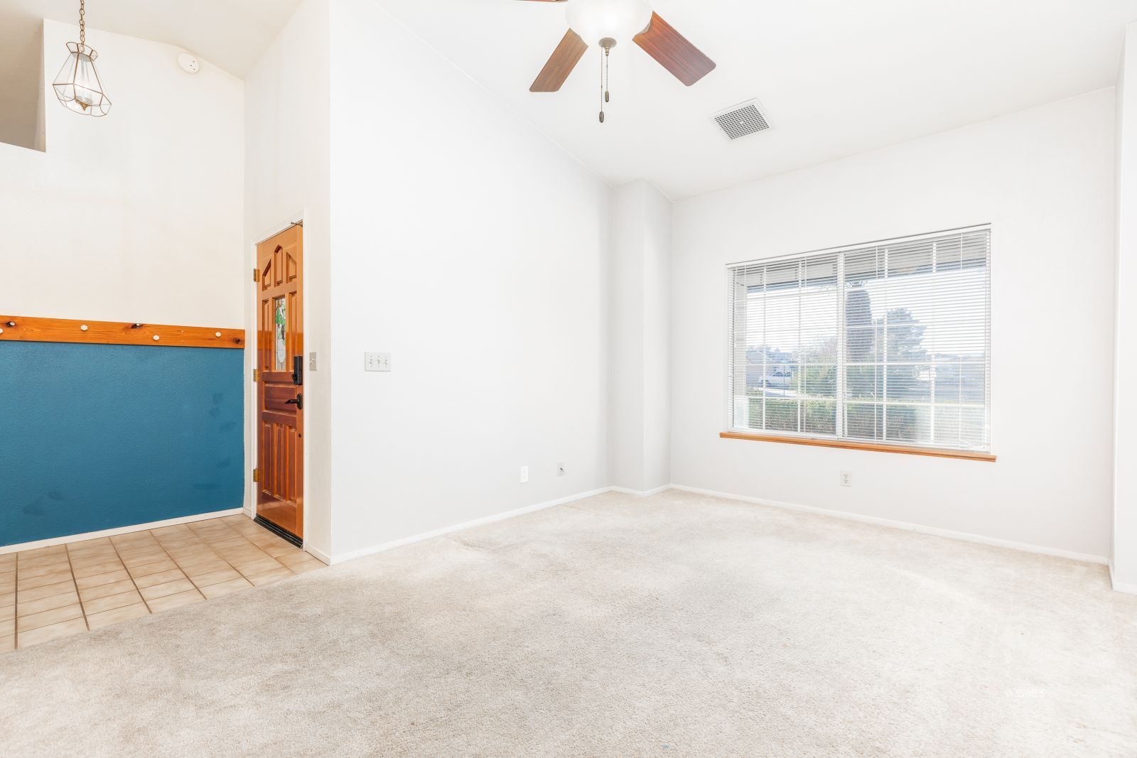 528 Amanda Street Ridgecrest, CA 93555 - Photo 7 of 30 a view of an empty room with a window