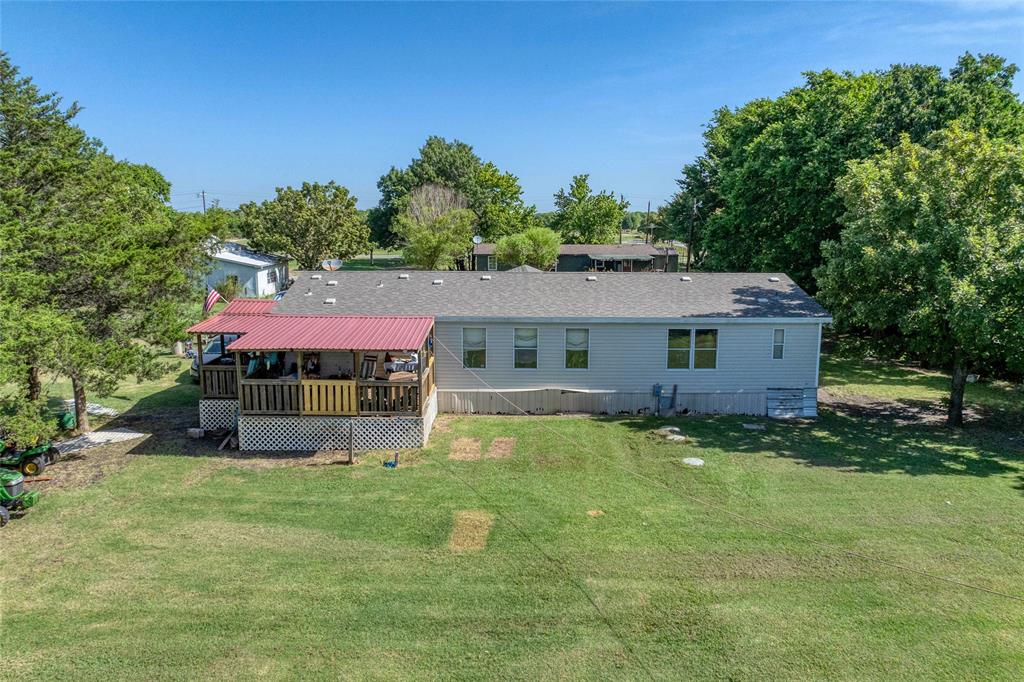 428 Pennell Road Sherman, TX 75090 - Photo 24 of 39 a view of a house with a yard