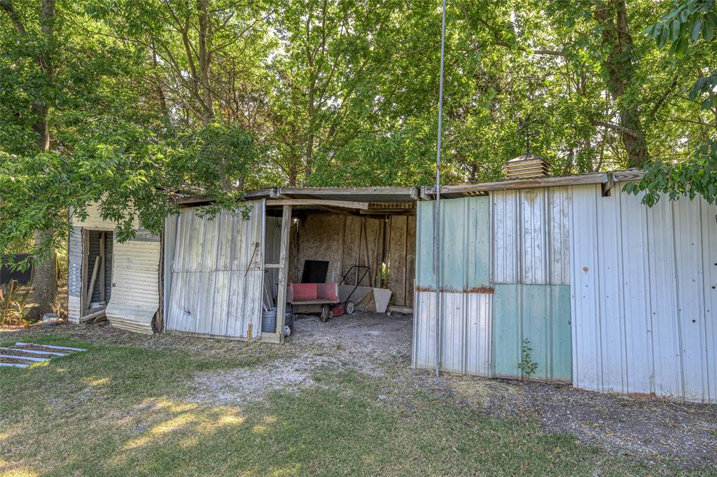 428 Pennell Road Sherman, TX 75090 - Photo 30 of 39 a view of a house with backyard and wooden fence