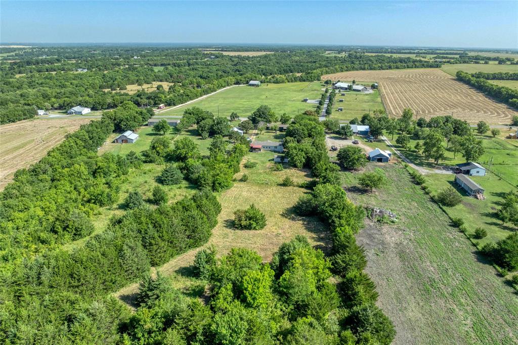 428 Pennell Road Sherman, TX 75090 - Photo 36 of 39 an aerial view of residential houses with outdoor space and trees