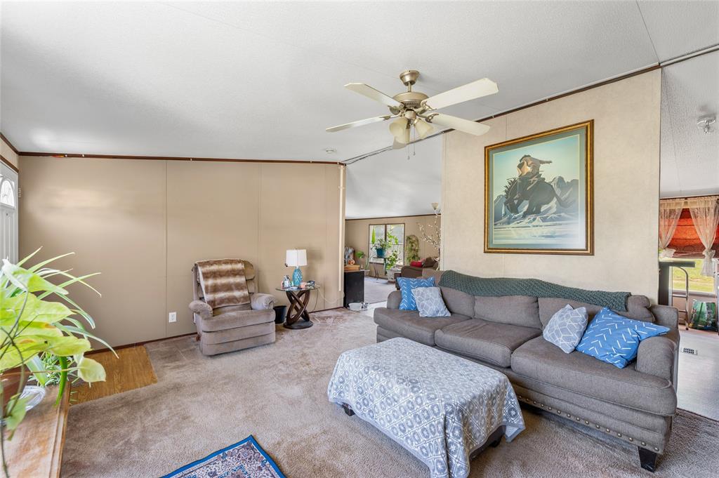 428 Pennell Road Sherman, TX 75090 - Photo 7 of 39 a living room with furniture and a couch