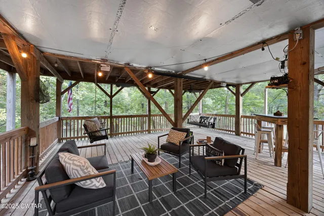 a view of a yard with large trees