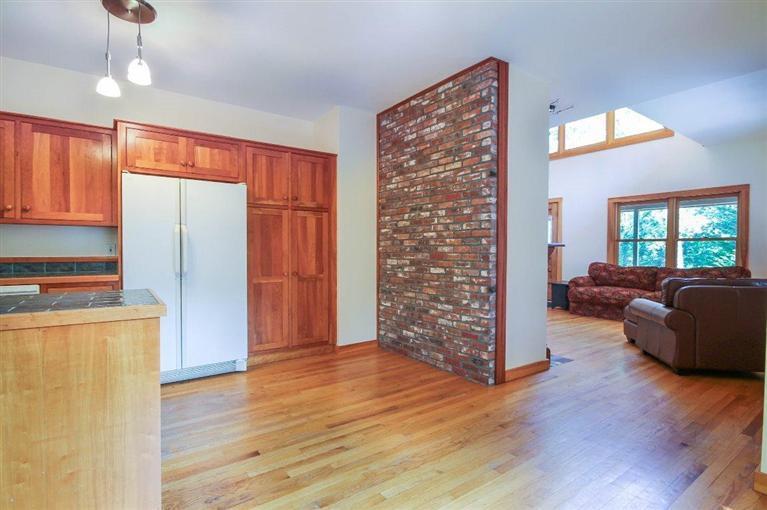 73 Pennywise Path Edgartown, MA 02539 - Photo 14 of 26 a living room with furniture wooden floor and a window
