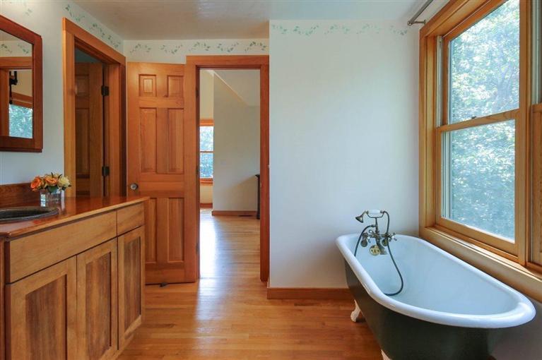 73 Pennywise Path Edgartown, MA 02539 - Photo 20 of 26 a bathroom with a granite countertop sink and a mirror