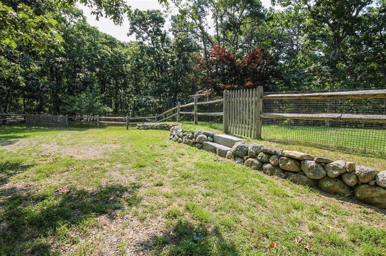 73 Pennywise Path Edgartown, MA 02539 - Photo 5 of 26 a view of a backyard with swimming pool